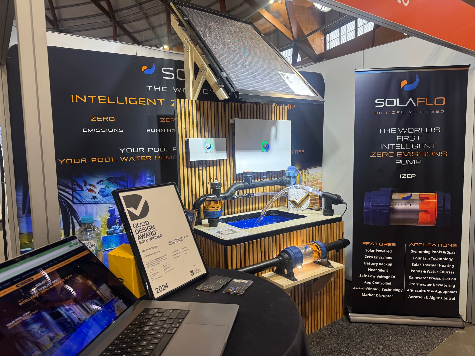 The SOLAFLO stand at the Everything Electric Show, Sydney Showgrounds, with the IZEP pump running live and the Good Design Award Gold Winner certificate on display